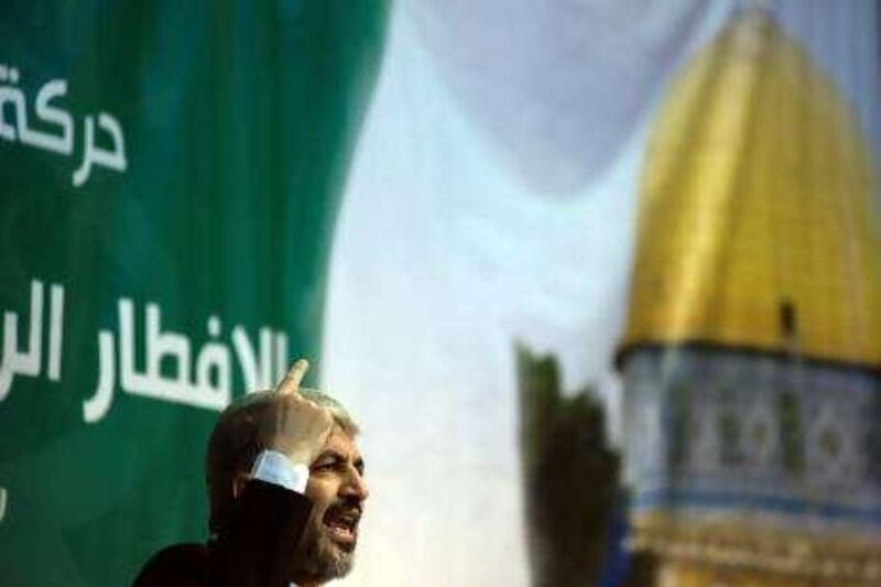 Khalid Meshaal, leader of the Islamic Resistance Movement Hamas, speaks ahead of a Ramadan Iftar in Damascus, Tuesday 24 August. After denouncing the resumption of direct peace talks between Israel and the Palestinian Authority, Mr Meshaal and invited guests ate, breaking the day's fast.