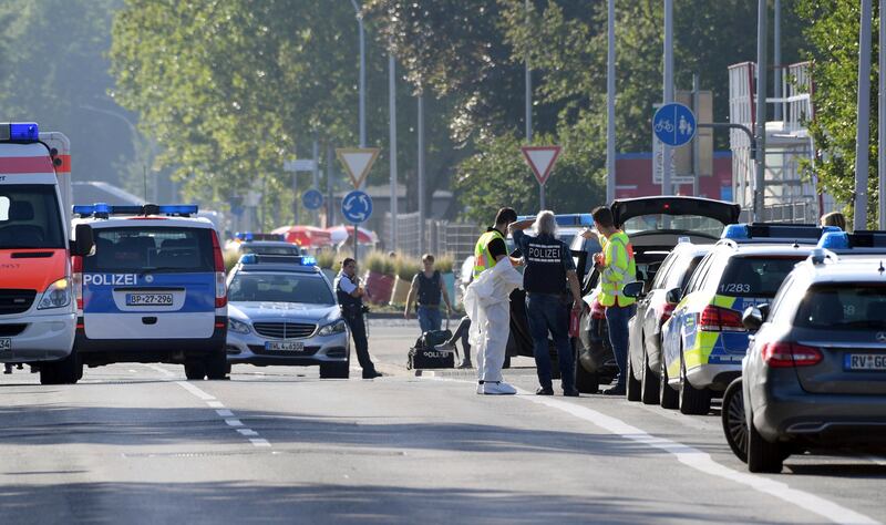 
                  Ambulances and police cars stand near a discotheque in Constance, at Lake Constance, Germany, Sunday, July 30, 2017. Police say a shooting in Germany’s Baden-Wurttemberg state has claimed two lives, including that of the gunman. They say the early-morning shooting Sunday at a discotheque in the town of Constance also left three guests seriously wounded. A tweet by Constance police says one person was killed by the shooter when he opened fire, also wounding the other victims. He then fled, was shot by police and died later in hospital.  (Felix Kaestle/dpa via AP)
               