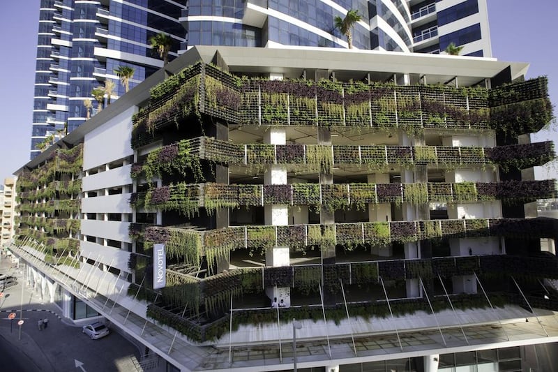 The hanging garden wall of the Novotel Dubai Al Barsha, which opened yesterday, has attracted much attention. “We would love to see as many people come here to learn what we are trying to achieve with the hanging garden,” said Phillipe Montaubin, the general manager of the hotel.  Jaime Puebla / The National 