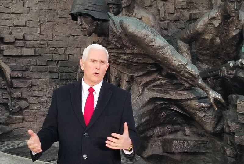 U.S. Vice President Mike Pence, speaks at the Warsaw Uprising Monument in Warsaw, Poland, on Thursday, Feb. 14, 2019. In a speech in Warsaw on Thursday, Pence reprimanded the U.K., France and Germany for creating a financing plan that would allow European companies to continue trading with Iran in spite of renewed American sanctions on the Islamic republic. Photographer: Glen Carey/Bloomberg