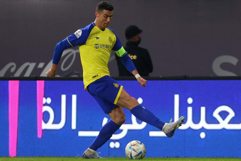 Cristiano Ronaldo dribbles with the ball. AFP