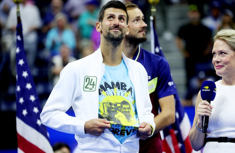 Tennis - U. S.  Open - Flushing Meadows, New York, United States - September 10, 2023 Serbia's Novak Djokovic celebrates while wearing a shirt with an image of Kobe Bryant after winning the U. S.  Open REUTERS / Mike Segar