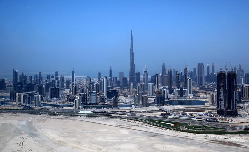 An ariel view shows the Burj Khalifa, the world's tallest tower, dominating the Dubai skyline on April 10, 2016.
For more than 10 years Dubai property prices have been on a roller coaster, creating and wiping out fortunes, but recently they appear to have run out of steam.

 / AFP PHOTO / MARWAN NAAMANI / TO GO WITH AFP STORY BY ALI KHALIL