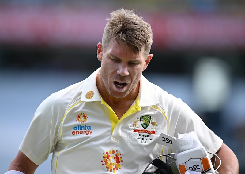 Australian batsman David Warner reacts after he was dismissed by England bowler Ollie Robinson for 94 runs. EPA
