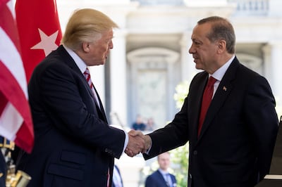 Donald Trump welcomes Turkish President Recep Tayyip Erdogan at the White House in 2017. The Trump family has extensive business ties in Turkey. Getty Images