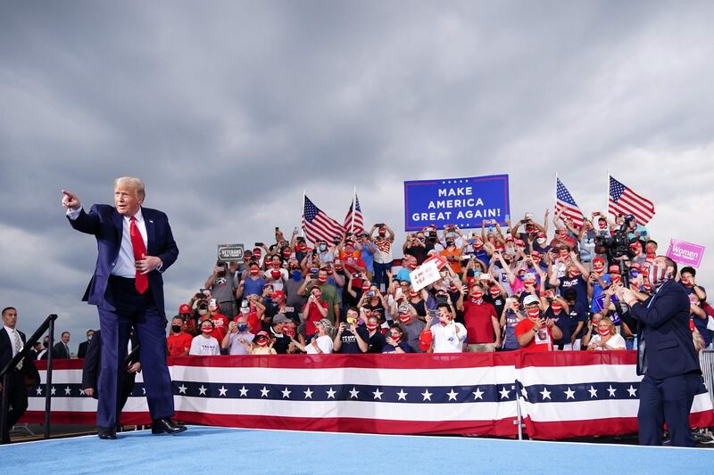 US President Donald Trump arrives for a campaign rally at Smith-Reynolds Regional Airport in Winston-Salem, North Carolina. AFP