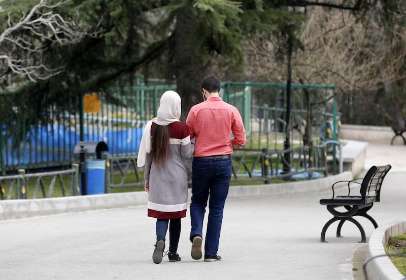 Iran's 'mehrieh', or affection system, where future husbands agree to pay a certain number of gold coins to the bride in the event of divorce, has left thousands of men languishing in jail. Atta Kenare/AFP

