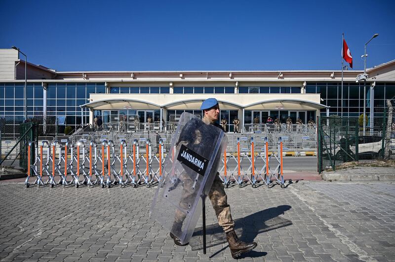Turkish soldiers stand guard in front of the Silivri Prison and Courthouse complex in Silivri, near Istanbul on February 18, 2020 during the trial of Gezi protests and civil society figure Osman Kavala, along with 15 other people, charged with seeking to overthrow the government. (Photo by Ozan KOSE / AFP)