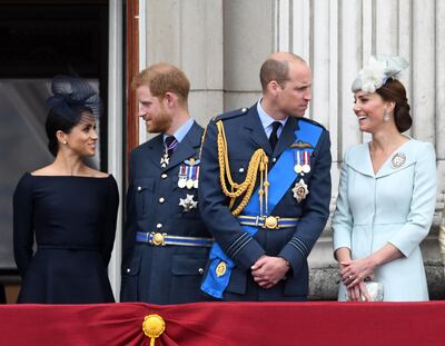 epa08116519 (FILE) - Prince William, Duke of Cambridge (2-R), Catherine, Duchess of Cambridge (R), Prince Harry, the Duke of Sussex (2-L) and Meghan, Duchess of Sussex (L) on the balcony of Buckingham Palace during the RAF100 parade celebrations in London, Britain 10 July 2018 (reissued 10 January 2020). Britain's Prince Harry and his wife Meghan have announced in a statement on 08 January that they will step back as 'senior' royal family members and work to become financially independent.  EPA/STR UK AND IRELAND OUT SHUTTERSTOCK OUT *** Local Caption *** 54479950
