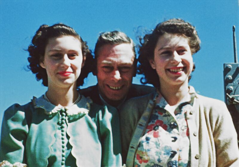 Previously unseen videos from Queen Elizabeth II's personal archive have been released, showing touching glimpses of “the fun behind the formality” of her royal life. Here Princess Margaret and then Princess Elizabeth pose with their father King George VI, on board the 'HMS Vanguard', in 1947. All photos: BBC/PA 