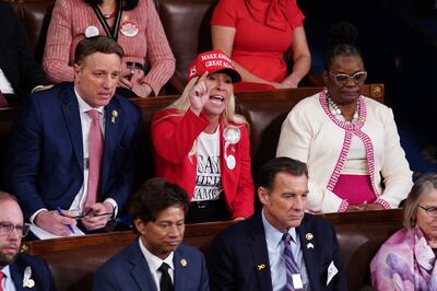 Marjorie Taylor Green, a Republican congresswoman from Georgia, frequently heckled Mr Biden as she wore a pro-Trump hat. EPA