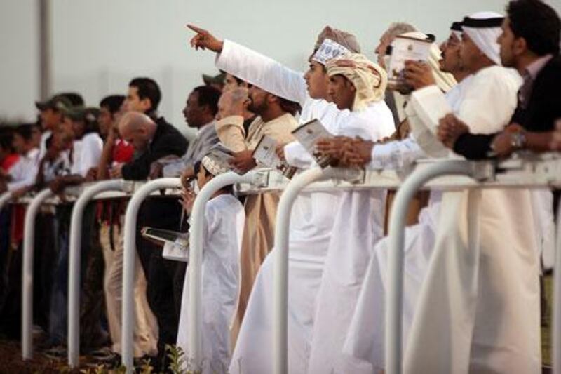 UAE horse racing crowds at Abu Dhabi Equestrian Club. Delores Johnson / The National