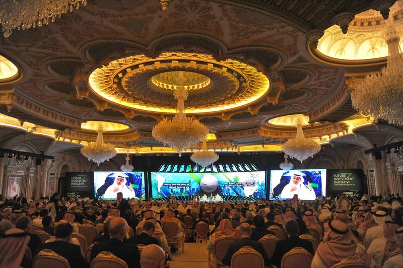 Participant listen at the start of Saudi Arabia's three-day Future Investment Initiative (FII) in Riyadh. AFP Photo