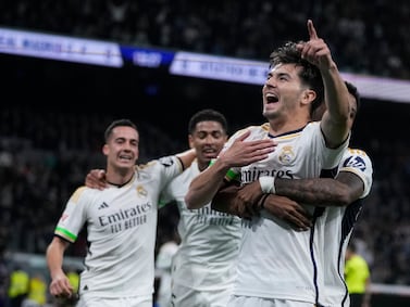 Real Madrid's Brahim Diaz, second from right, celebrates with teammates after scoring the opening goal during the Spanish La Liga soccer match between Real Madrid and Atletico Madrid at the Santiago Bernabeu stadium in Madrid, Spain, Sunday, Feb.  4, 2024.  (AP Photo / Bernat Armangue)