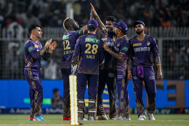 Kolkata Knight Riders' Andre Russell, second left, celebrates with teammates after taking the wicket of Royal Challengers Bengaluru's Rajat Patidar during the Indian Premier League game at Eden Gardens in Kolkata on April 21, 2024. Kolkata won the match by one run. AFP