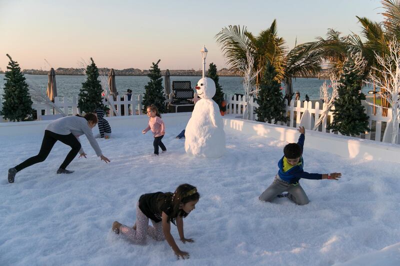 DUBAI, UNITED ARAB EMIRATES - DEC 20, 2017. 

Children play at the winter wonderland in La Mer.

(Photo by Reem Mohammed/The National)

Reporter: XMAS 
Section: NA