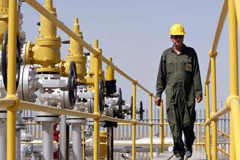 Iran's oil production fell below Iraq's last year. Vahid Salemi / AP
