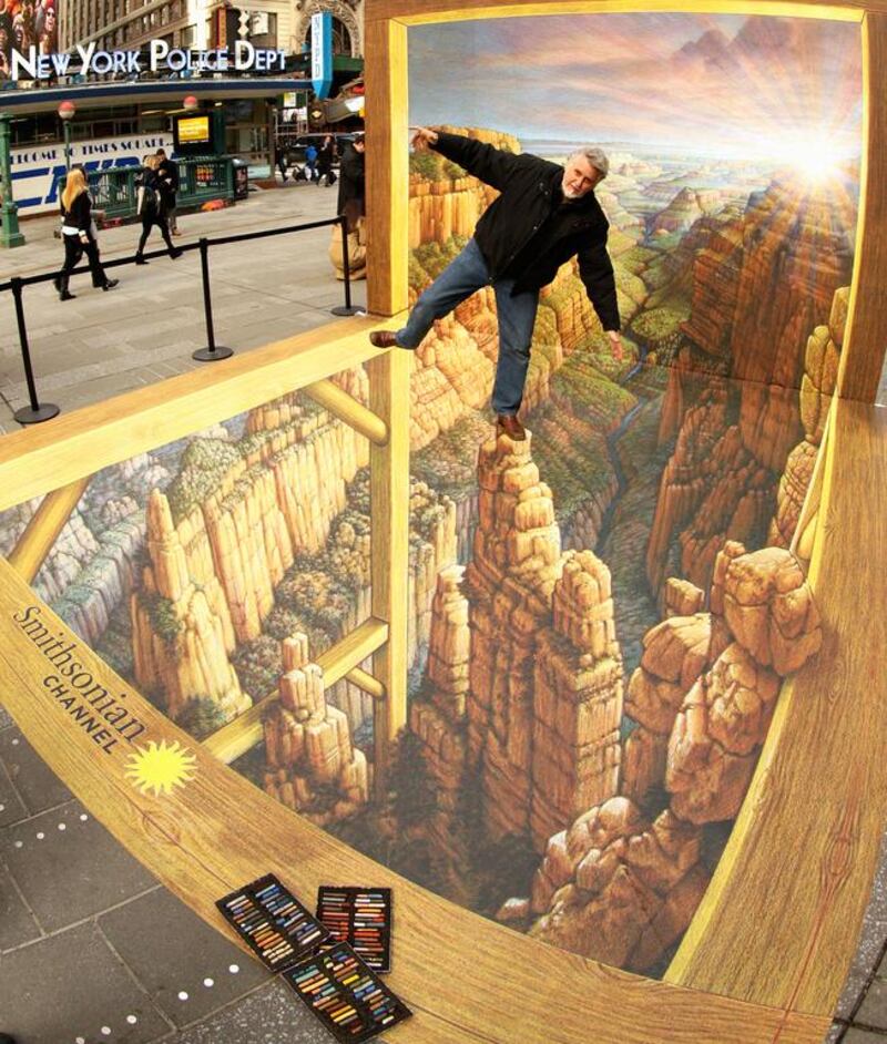 The artist Kurt Wenner in Times Square, New York, with his pavement art inspired by the Grand Canyon. Andrew Toth / Getty Images

