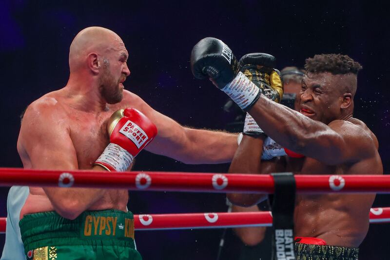Tyson Fury throws a jab during his heavyweight boxing fight against Francis Ngannou in Riyadh on October 29, 2023. AFP