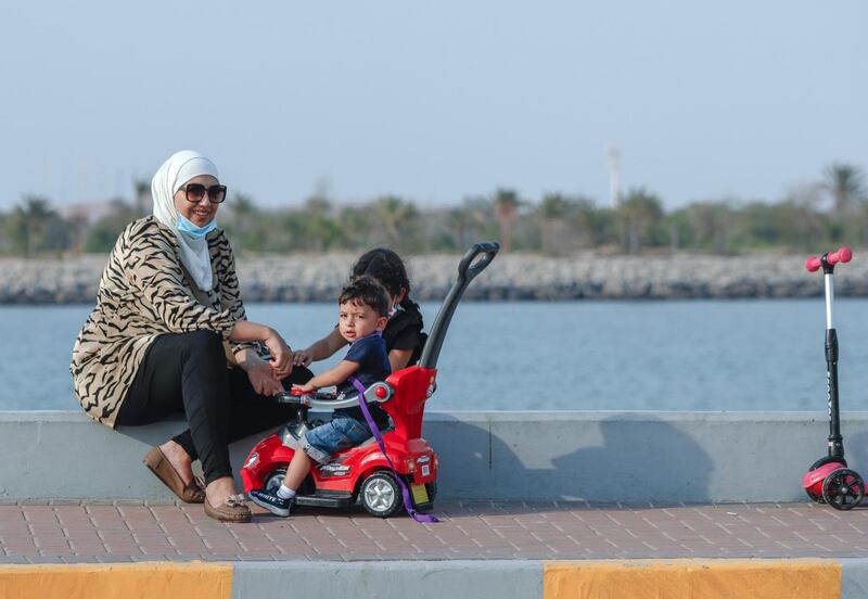 Abu Dhabi, United Arab Emirates, August 14, 2020.  The UAE flag area at the Corniche is slowly getting more and more active as Covid-19 restrictions ease.
Victor Besa /The National
Section:  NA
For:  Standalone/Stock Images