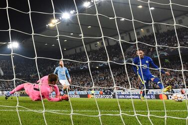 Chelsea's Moroccan midfielder Hakim Ziyech (R) scores the opening goal past Malmo's Swedish goalkeeper Johan Dahlin (L) during the UEFA Champions League group H football match Malmo FF v Chelsea FC in Malmo, Sweden on November 2, 2021.  (Photo by Jonathan NACKSTRAND  /  AFP)