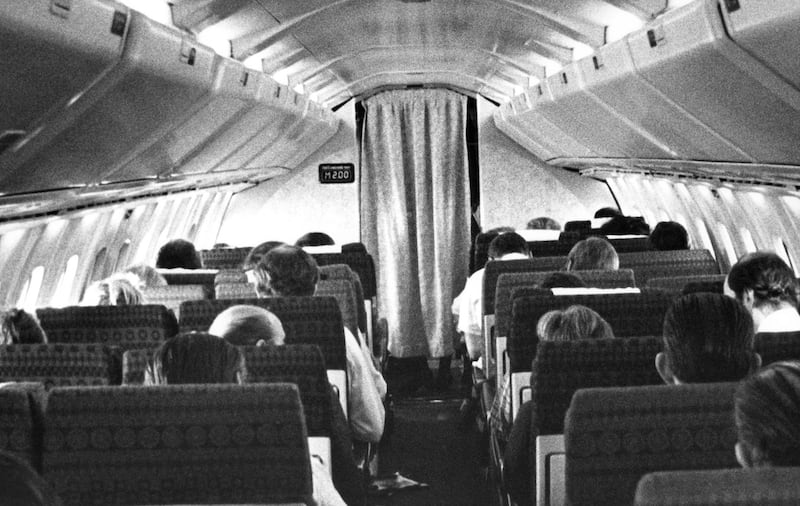 Passengers aboard a Concorde supersonic jetliner flight await lunch as the delta-winged aircraft cruises over the Atlantic Ocean at twice the speed of sound, May 1978. The digital display on the left bulkhead at the front of the cabin shows that the plane has reached Mach 2. (AP Photo)