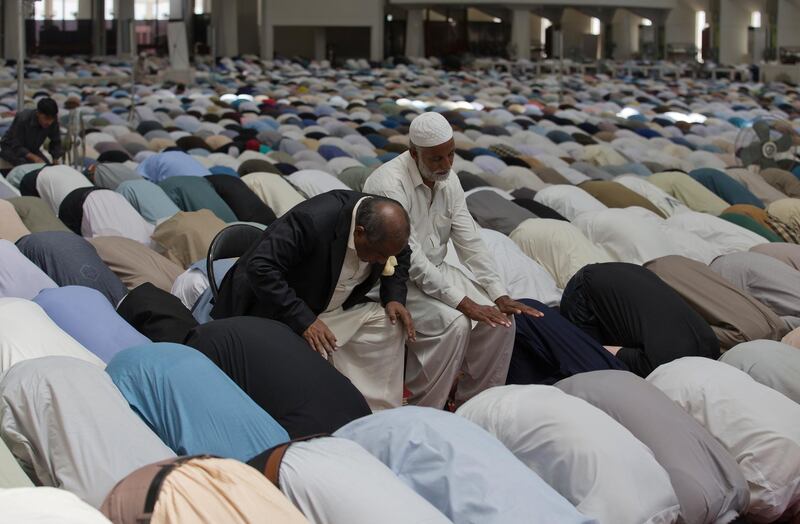 People offer prayers at the Faisal mosque on the first Friday of Ramadan in Islamabad, Pakistan. Muslims throughout the world are marking Ramadan, the holiest month in the Islamic calendar, in which devotees refrain from eating, drinking, smoking and sex from sunrise to sunset. AP Photo