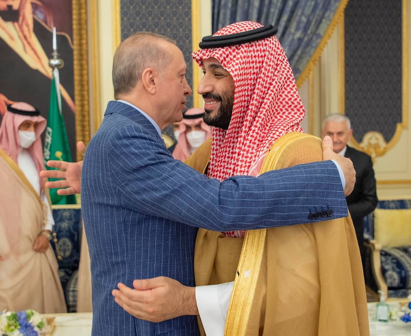 Crown Prince Mohammed bin Salman welcomes Mr Erdogan at the Jeddah palace. 