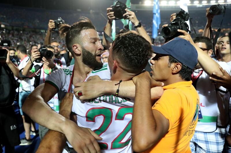 Algeria players celebrate their win over Nigeria. AFP
