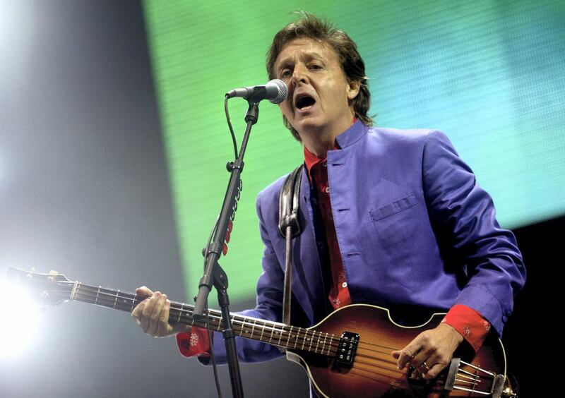 SOMERSET, ENGLAND - JUNE 26:  Paul McCartney performs on the Pyramid stage at Worthy Farm, Pilton, Somerset, at the 2004 Glastonbury Festival June 26, 2004. The festival spans over 3 days and runs until June 27.   (Photo by Matt Cardy/Getty Images)