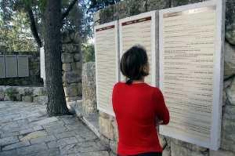 JUNE 2009, WEST BANK: Rows of plaques in Canada Park, honouring donors, have been fixed to stone walls made from the rubble of Palestinian homes destroyed during  
the 1967 war. Jonathan Cook/The National