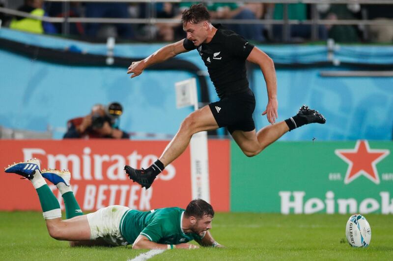 New Zealand's wing George Bridge jumps over Ireland's centre Robbie Henshaw during the Japan 2019 Rugby World Cup quarter-final match between New Zealand and Ireland at the Tokyo Stadium in Tokyo. AFP