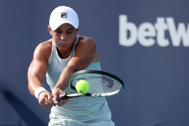 Apr 1, 2021; Miami, Florida, USA; Ashleigh Barty of Australia hits a backhand against Elina Svitolina of Ukraine (not pictured) in a women's singles semifinal in the Miami Open at Hard Rock Stadium. Mandatory Credit: Geoff Burke-USA TODAY Sports