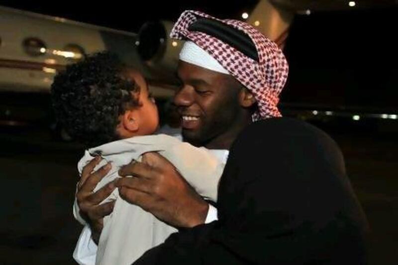 Mohammed Khamis Majed, 29, was greeted by family members and the minister, Sheikh Saif bin Zayed, upon arrival in the UAE Wednesday. The former Special Forces officer had been held to ransom by an armed gang in Nigeria since January 21.