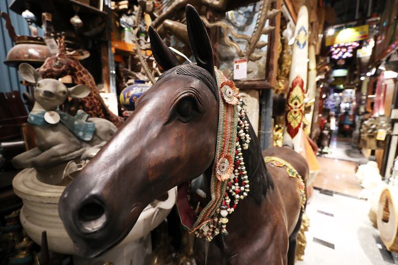 A teak horse from Thailand is on display at the Antique Museum in Al Quoz. Pawan Singh / The National