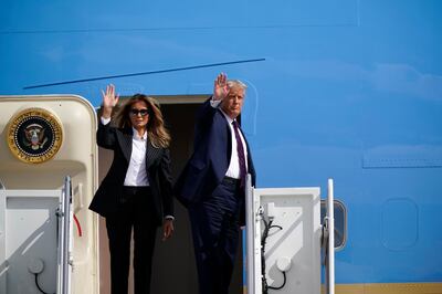 President Donald Trump and first lady Melania Trump wave before boarding Air Force One to travel to the first presidential debate in Cleveland, Tuesday, Sept. 29, 2020, in Andrews Air Force Base, Md. (AP Photo/J. Scott Applewhite)