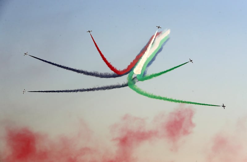 The UAE's Al Fursan aerobatic display team perform on the last day of Expo 2020 Dubai. Pawan Singh / The National
