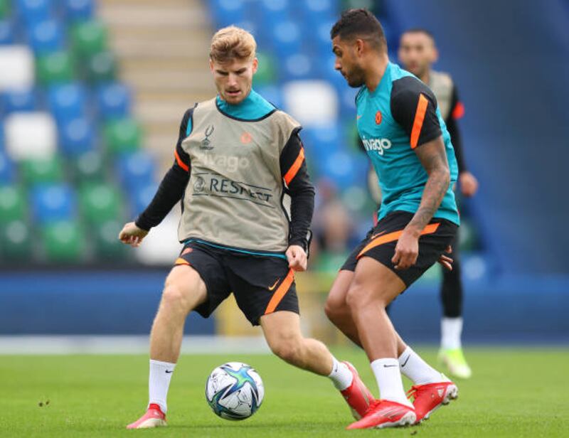 Timo Werner is challenged by Emerson during Chelsea's training session.