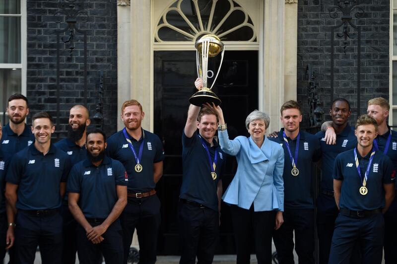 Eoin Morgan and the England cricket team pose with Theresa May at Downing Street. Getty Images