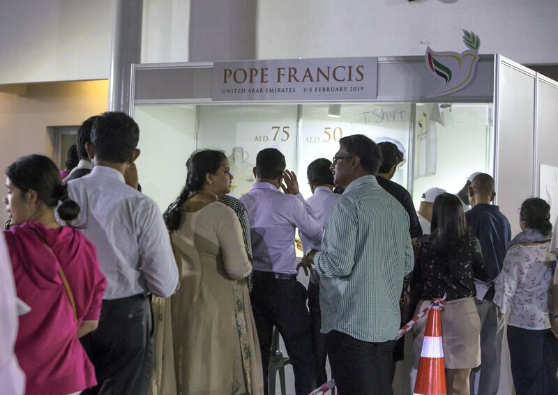 DUBAI, UNITED ARAB EMIRATES -People queuing for the Pope merchandise at St. Mary's Catholic Church, Oud Mehta.  Leslie Pableo for The National for Patrick Ryan's story