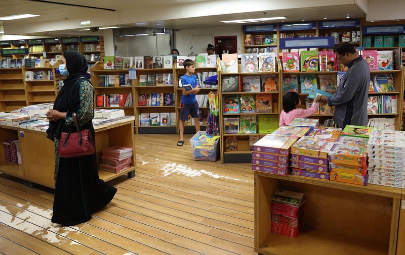 Visitors browse books aboard the world's largest floating book fair