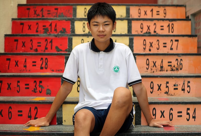 Xiao Zhang, 13, says teachers help pupils who do not speak Chinese fluently