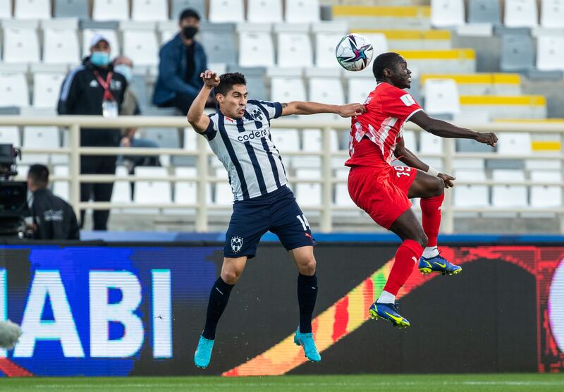 Erick Aguirre of Monterrey battles for a header with Al Jazira's Oumar Traore. Victor Besa / The National