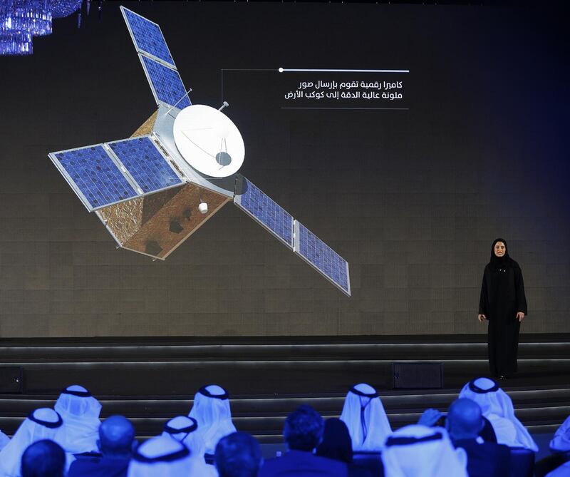 Sarah Amiri, deputy project manager of the United Arab Emirates (UAE) Mars Mission, stands on stage during a ceremony to unveil the mission on May 6, 2015 in Dubai. The UAE Mars Mission aims to provide a global picture of the Martian atmosphere through a probe named Al Amal to be launched in July 2020 to reach Mars in 2021, according to the engineers involved in the project.  AFP PHOTO / KARIM SAHIB (Photo by KARIM SAHIB / AFP)