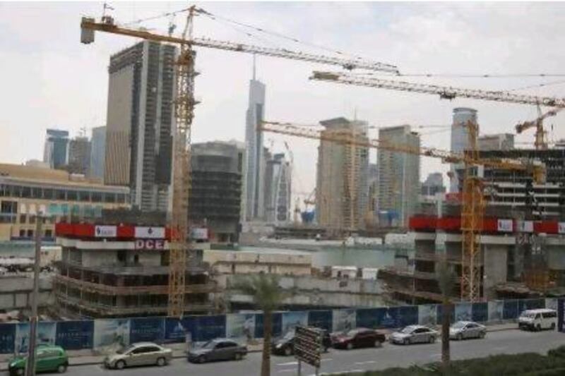 During the boom years, it was widely believed that 25 per cent of the world's construction cranes were in Dubai. Randi Sokoloff / The National
