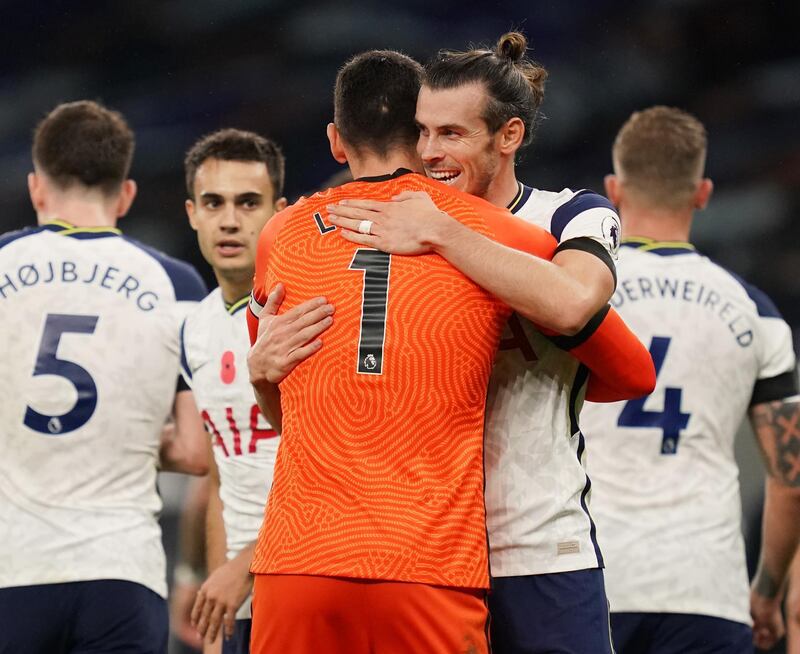Gareth Bale celebrates after the match with Hugo Lloris. Reuters