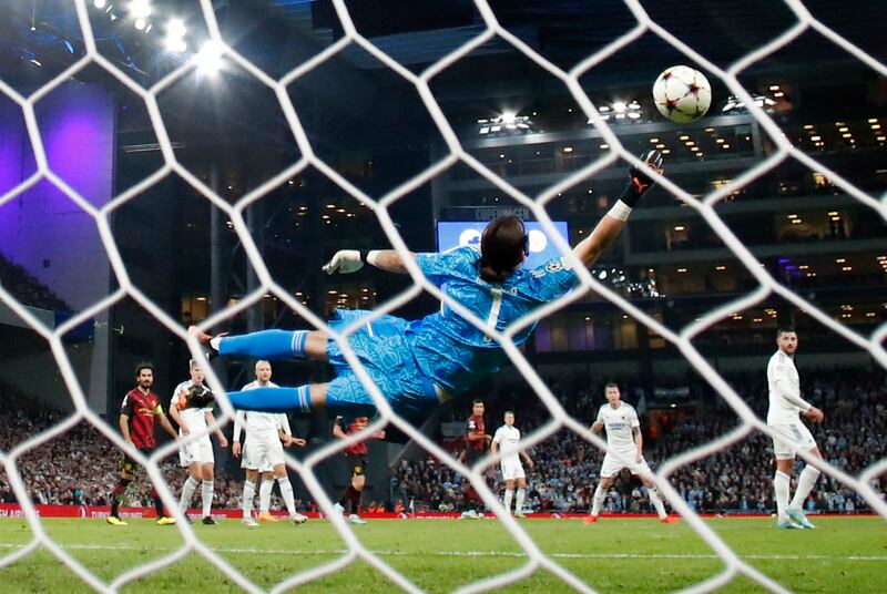 FC Copenhagen goalkeeper Kamil Grabara saves a penalty from Manchester City's Riyad Mahrez. Action Images 