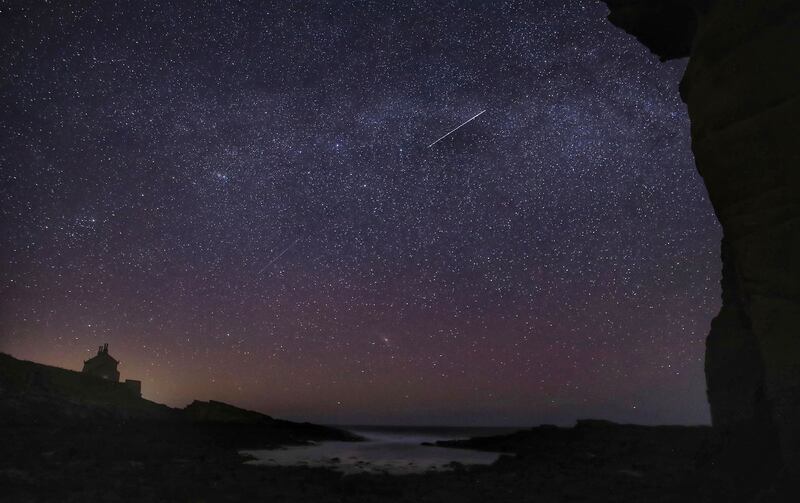 Milky Way and Lyrid meteors falling through the sky in north-east England in April.