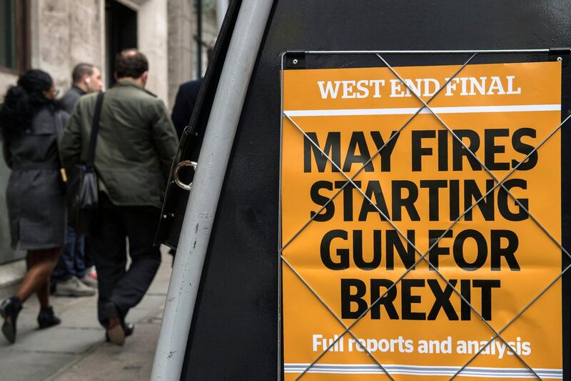 A newspaper stand shows an advert for today's Evening Standard newspaper, leading with the story relating to British Prime Minister Theresa May's triggering of Article 50 of the Lisbon Treaty to begin the process of Britain's withdrawal from the European Union (EU), in London on March 29, 2017. - Britain launched the process to leave the European Union Wednesday, saying there was "no turning back" from the historic move that has split the country and thrown the bloc's future into question. (Photo by CHRIS J RATCLIFFE / AFP)