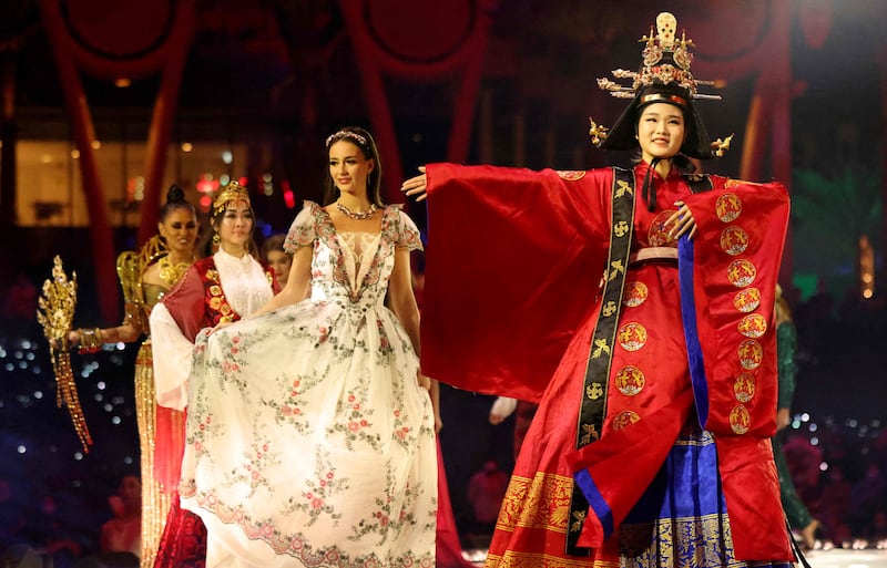 Performers walk on stage during the China pavilion day at the Dubai Expo 2020 in January 2022. AFP